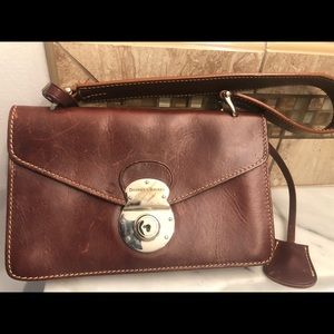 Never used Dooney & Bourke man/woman wristlet